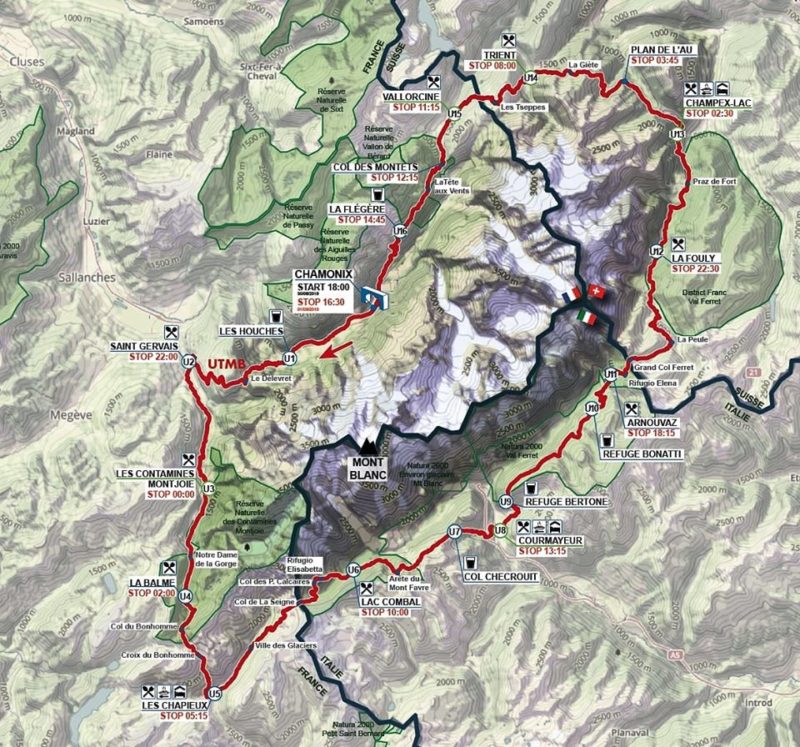 Trailrunner beim UTMB Mont-Blanc auf steilem Bergpfad, hartes Ultratrail-Rennen in den Alpen.